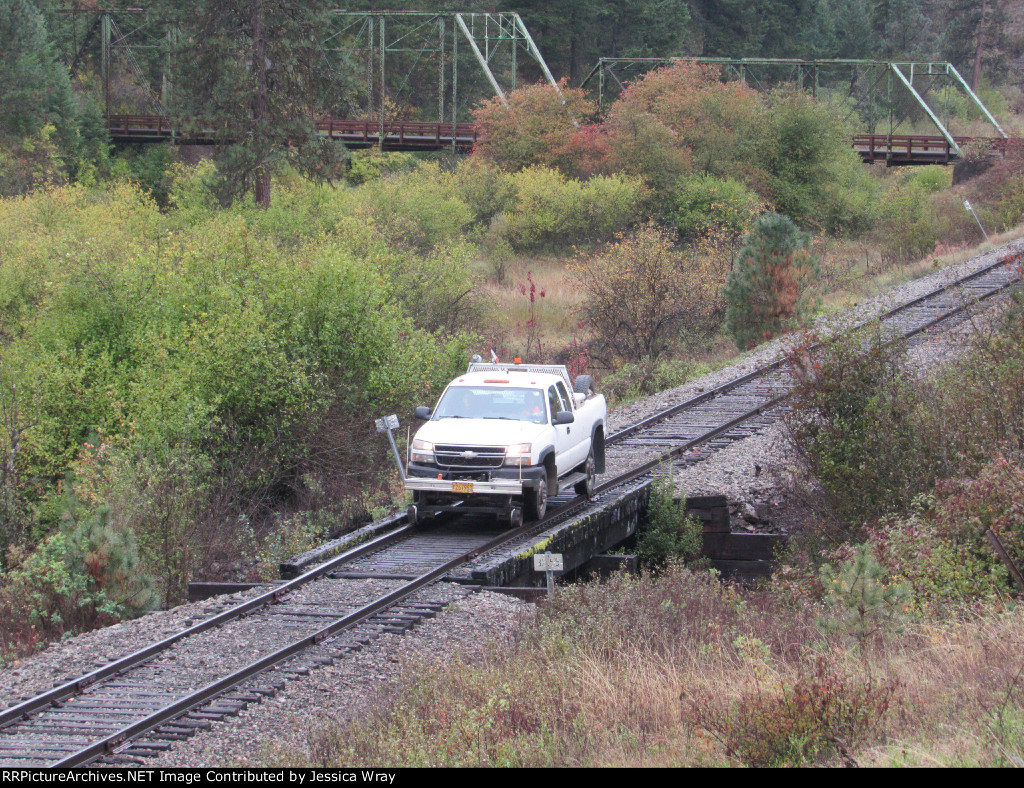 Hyrail running ahead of the excursion train to look out for rockslides on this rainy day